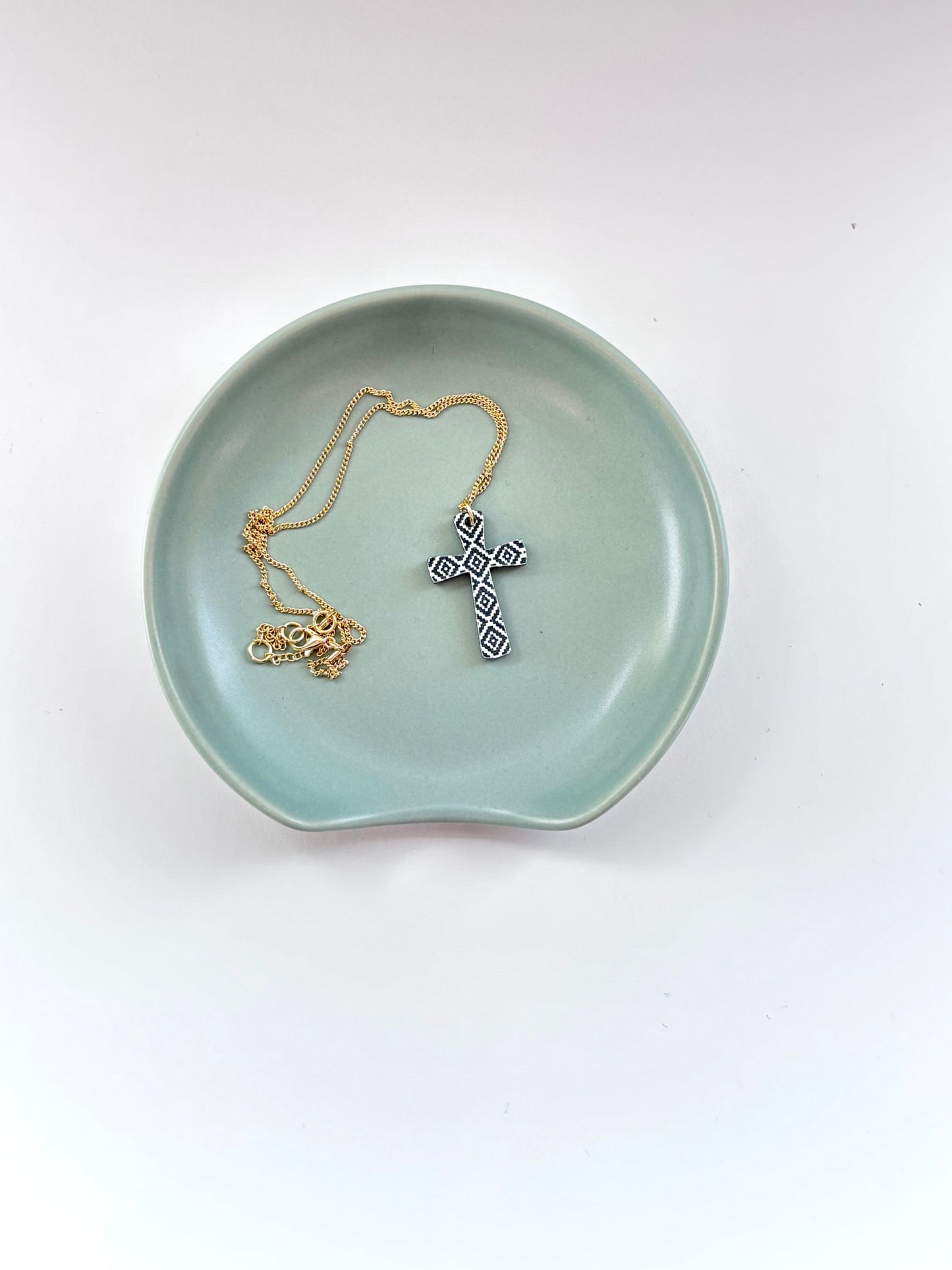 Gold Cross Necklace – Black & White Geometric Design